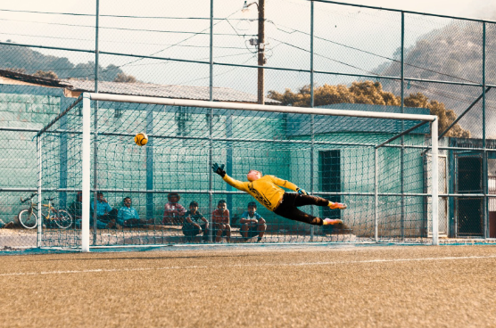 https://unsplash.com/photos/man-jump-about-to-hold-ball-near-net-6dRiUBjRvsM